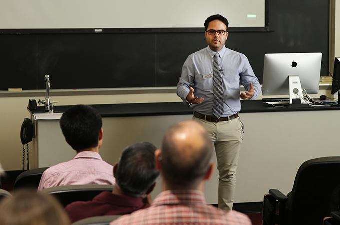 A University of Redlands professor presents his research during a faculty technology grant showcase.
